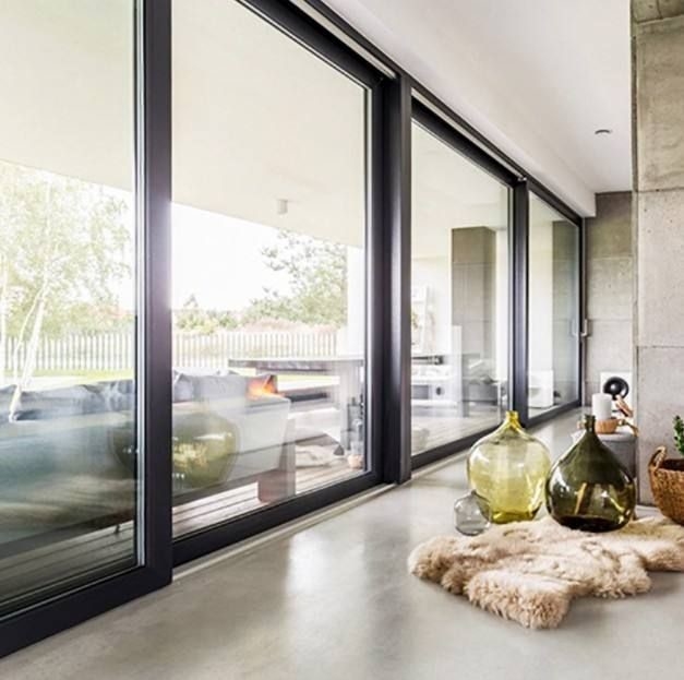 Porte scorrevoli in alluminio di design moderno SKATE con isolamento acustico da 35 dB per abitazioni